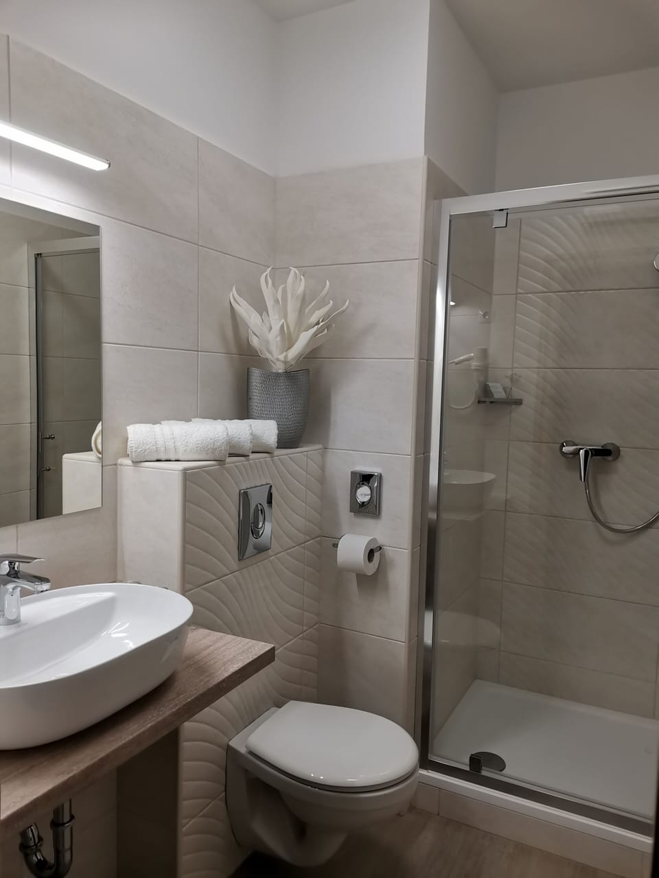 Shower, free toiletries, hair dryer, towels