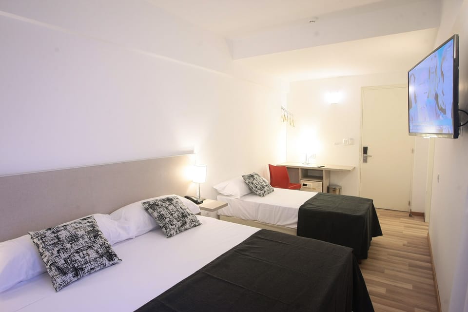 Triple Room | In-room safe, blackout drapes, soundproofing, iron/ironing board