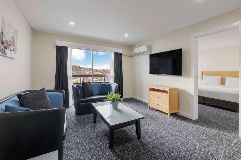 Standard Apartment, Multiple Beds, Non Smoking, Balcony | Premium bedding, laptop workspace, blackout drapes, iron/ironing board