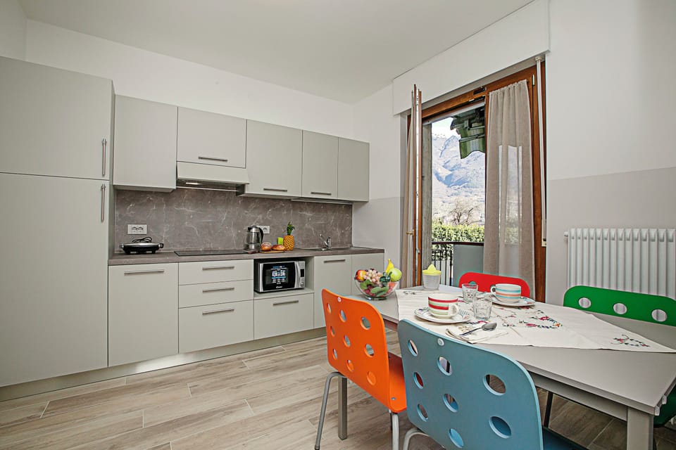 Family Apartment, Multiple Bedrooms (Bella Arco Apartment) | Private kitchen | Full-size fridge, microwave, stovetop, electric kettle