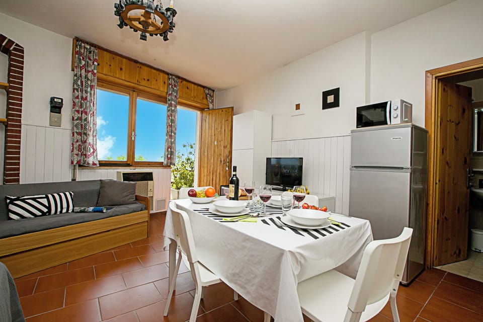 Family Studio, Mountain View, Mountainside (Tremosine Wonderful Lake View 1) | Living area | 22-inch flat-screen TV with cable channels, TV