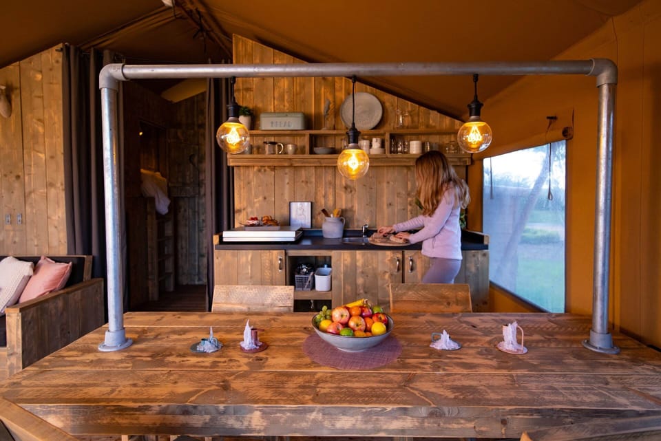 Campsite - Combined Tents With Kitchen and Bathroom Located Near a Pond Campground/ 
RV Resort in Flevoland, Netherlands