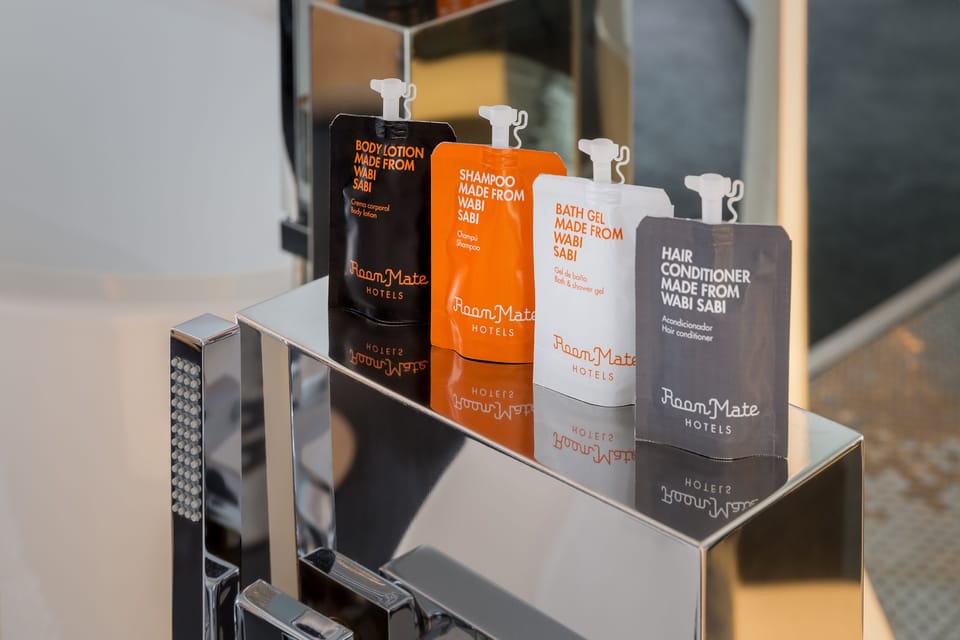 Rainfall showerhead, eco-friendly toiletries, hair dryer, towels