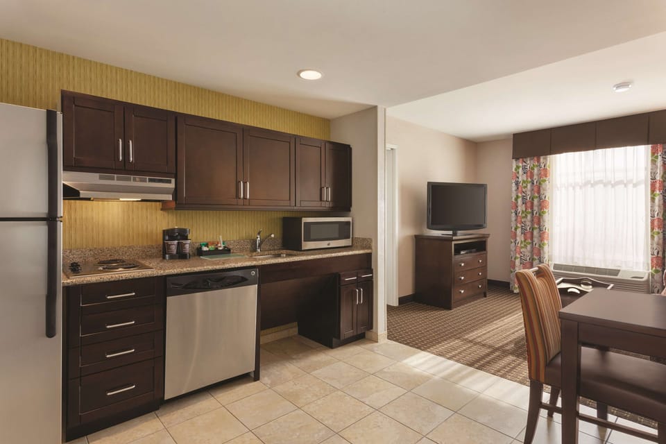 Suite, 1 King Bed, Accessible, Bathtub | In-room safe, desk, laptop workspace, soundproofing
