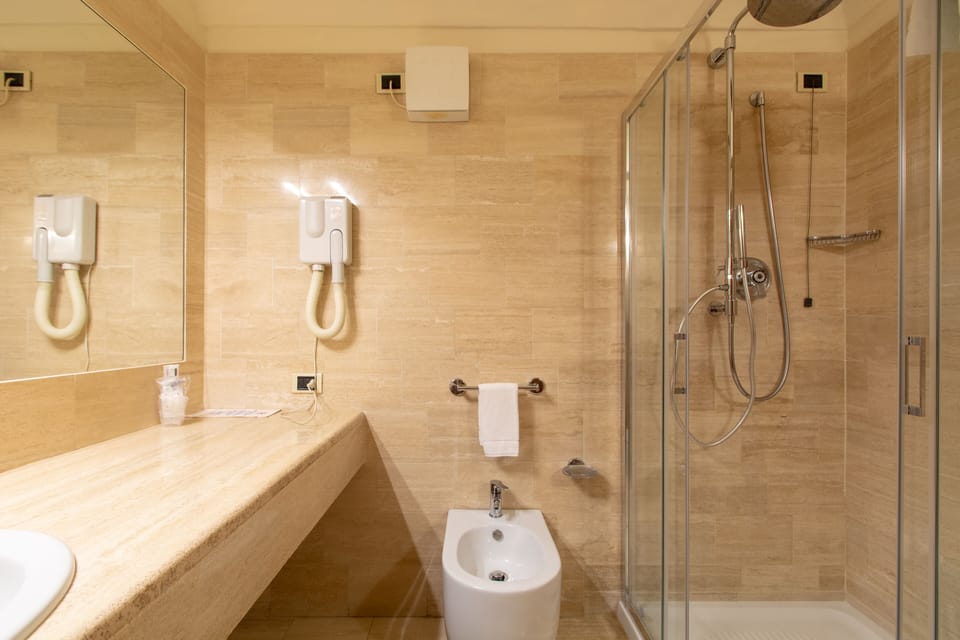 Free toiletries, hair dryer, bathrobes, bidet