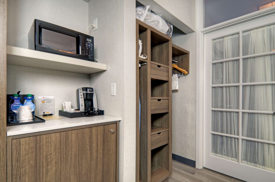 One King One Bedroom Suite | Desk, laptop workspace, iron/ironing board, free cribs/infant beds