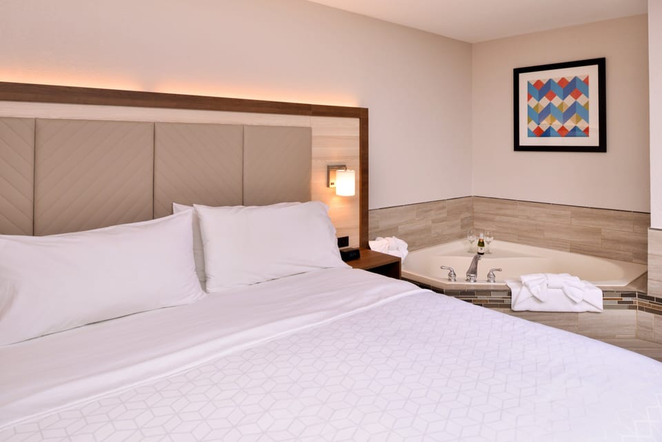 Suite, 1 King Bed, Jetted Tub | In-room safe, desk, blackout drapes, iron/ironing board