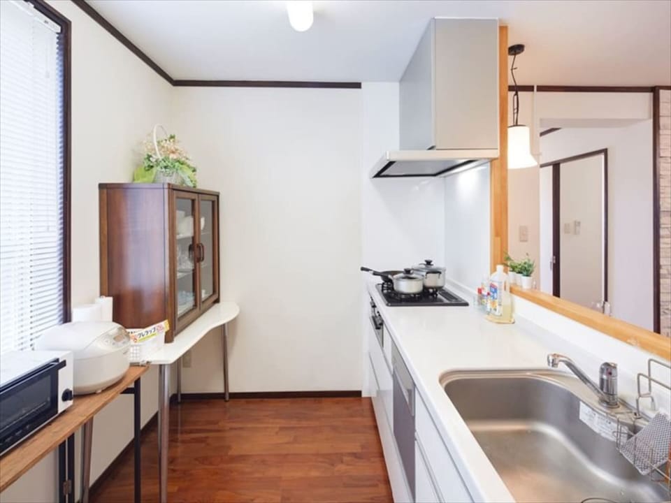 3 Bedrooms Apartment | Private kitchen | Fridge, microwave, stovetop, electric kettle