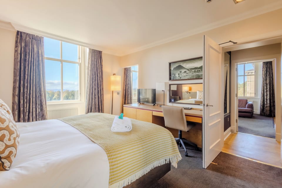 Superior Suite | In-room safe, desk, laptop workspace, blackout drapes