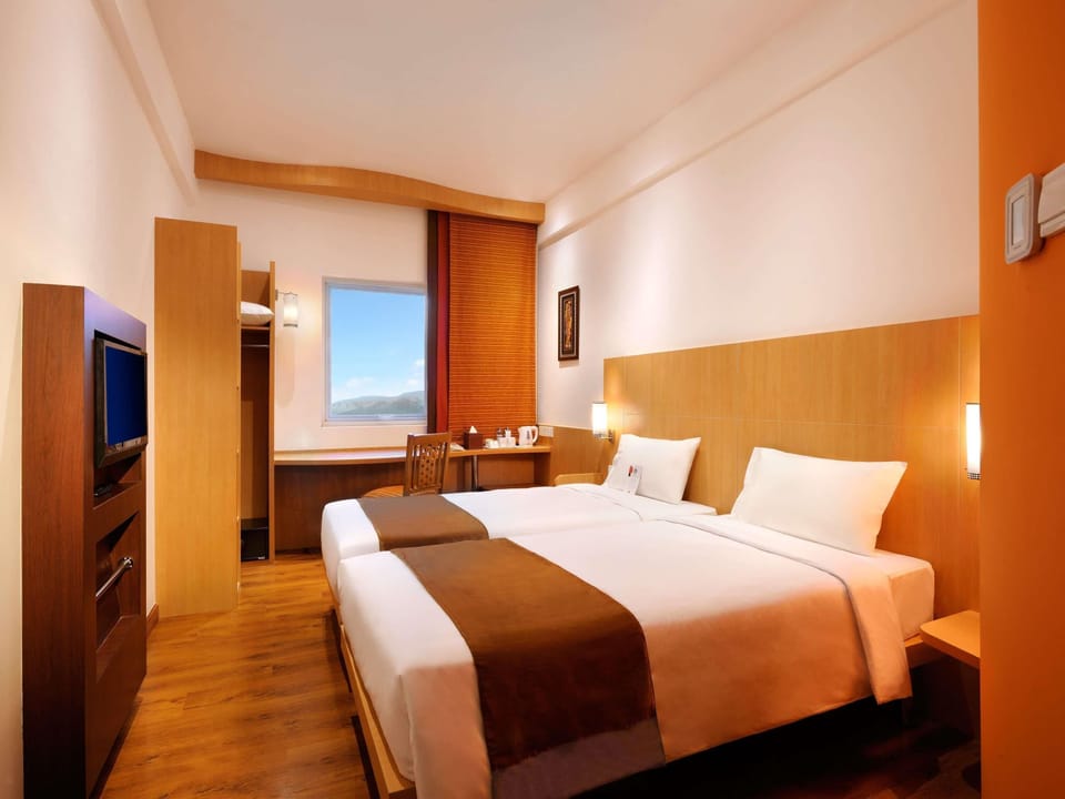 Standard Room, 2 Twin Beds | In-room safe, desk, soundproofing, iron/ironing board