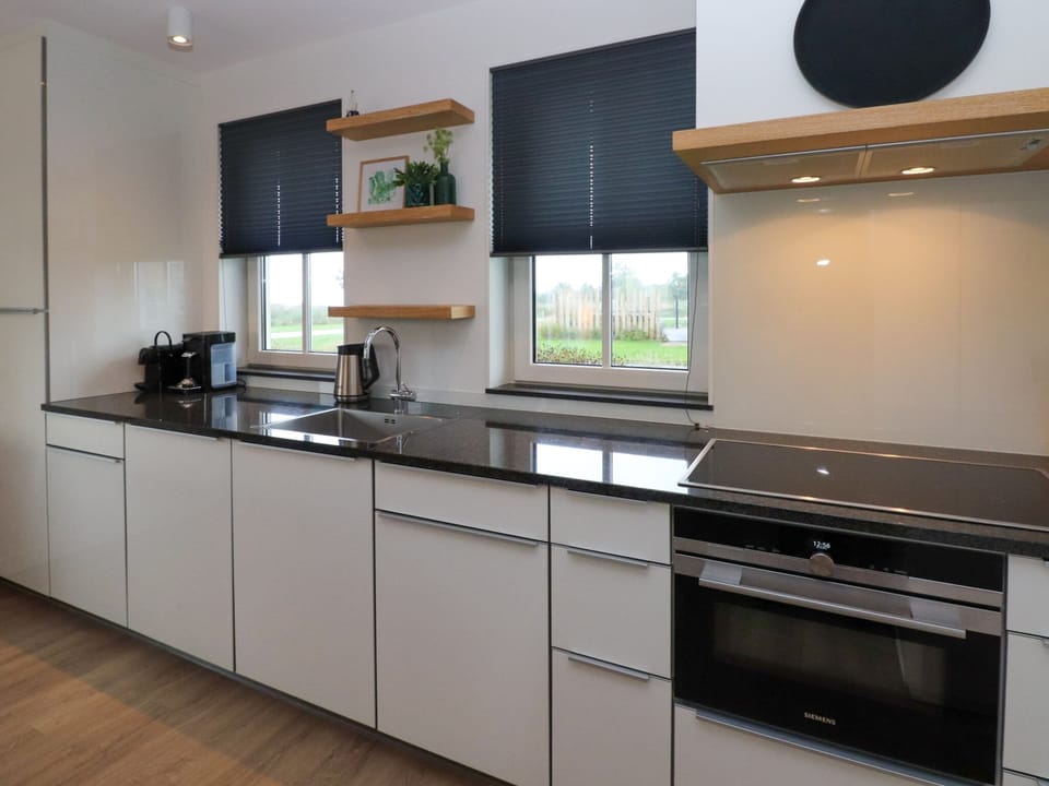 Villa | Private kitchen | Microwave, electric kettle, dining tables