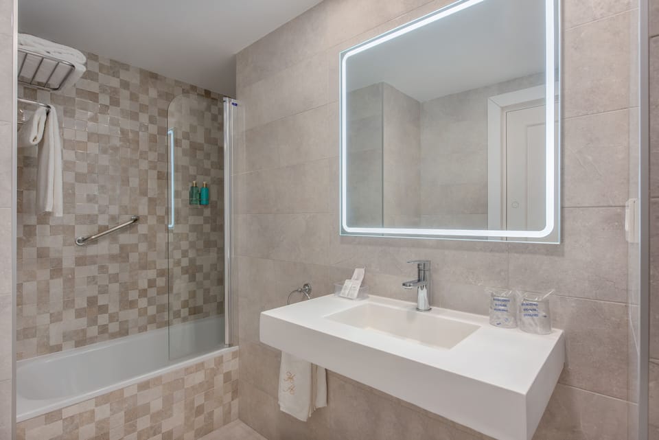 Deep soaking tub, rainfall showerhead, free toiletries, hair dryer