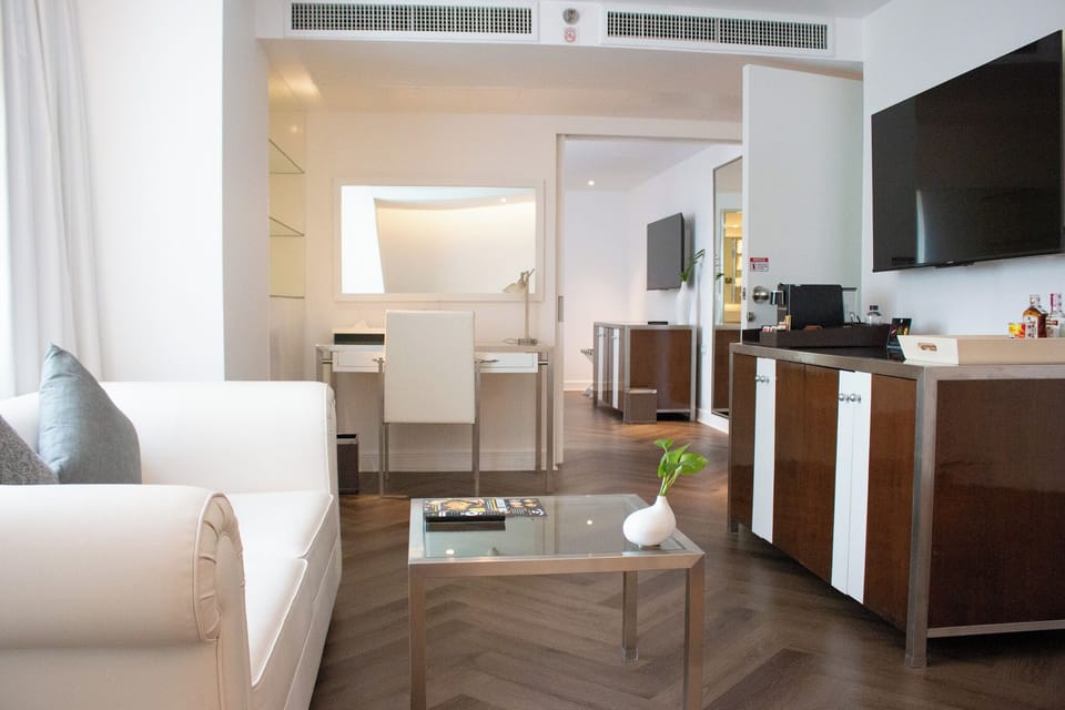 Family Suite Connecting Room | Living area | 42-inch LED TV with cable channels, TV
