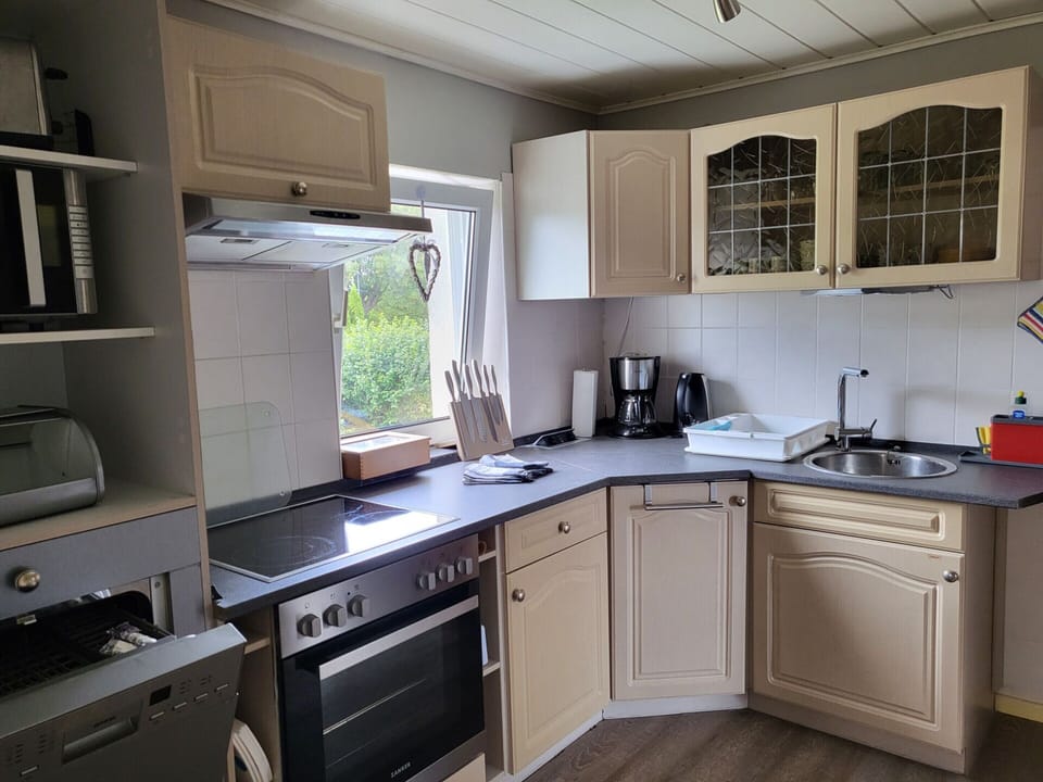 Apartment | Private kitchen | Microwave, stovetop, dishwasher, coffee/tea maker