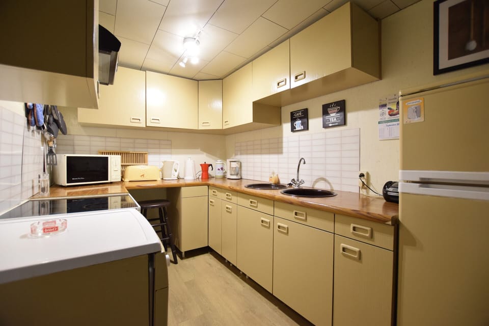 Cottage | Private kitchen | Microwave, highchair
