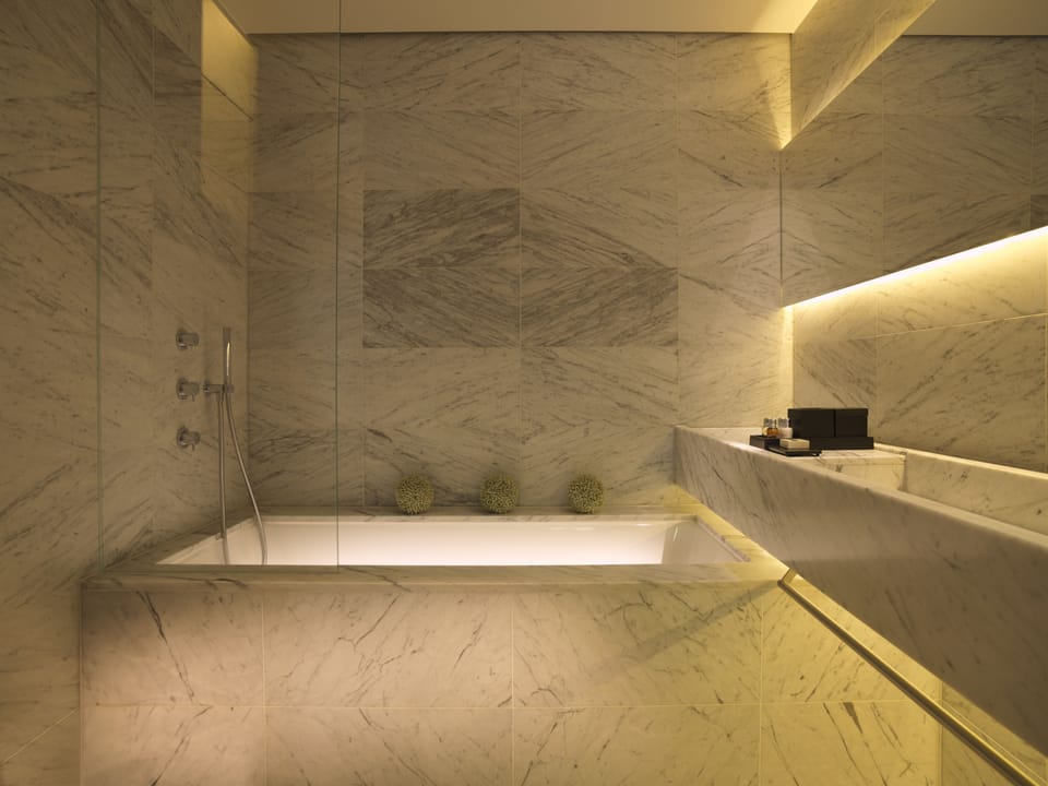 Rainfall showerhead, designer toiletries, hair dryer, towels