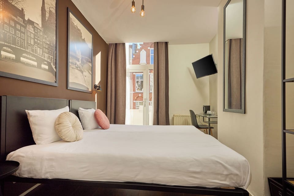 Standard Room, 2 Twin Beds, Private Bathroom | Blackout drapes, iron/ironing board, free cribs/infant beds, free WiFi