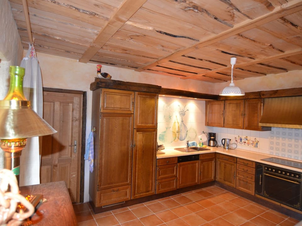 Villa | Private kitchen | Stovetop, highchair