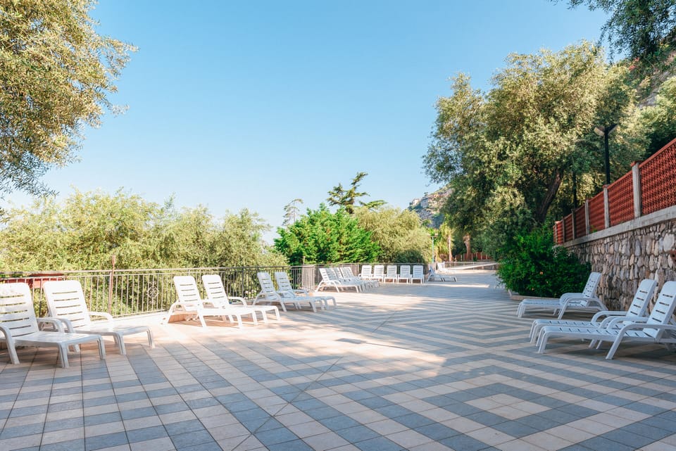 Seasonal outdoor pool, pool umbrellas, sun loungers