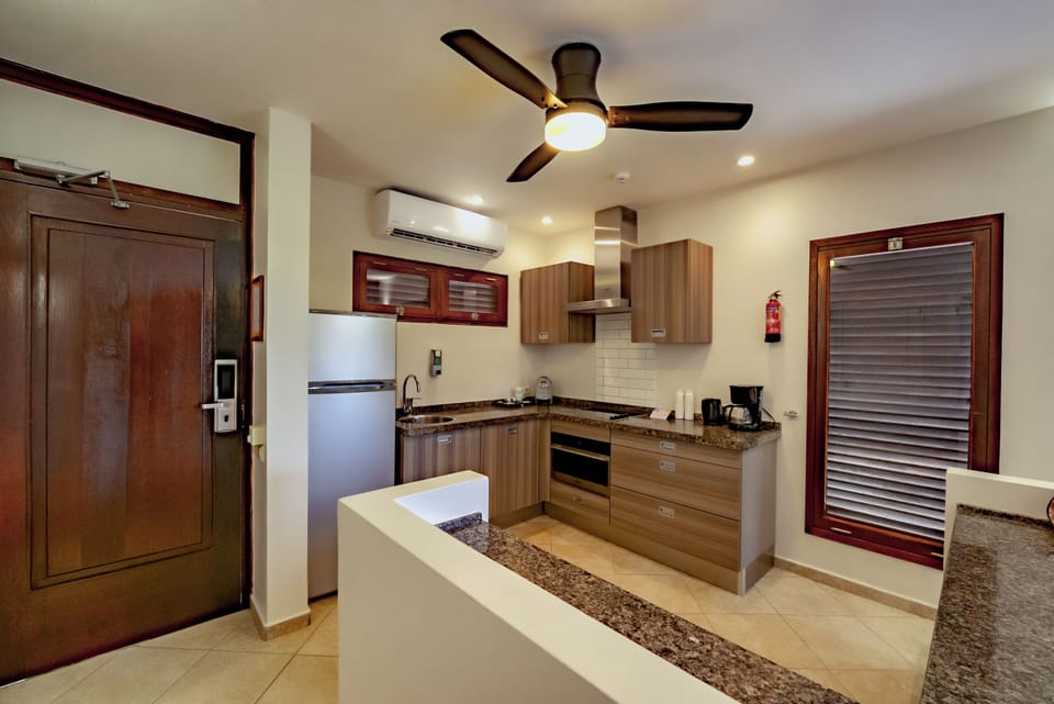 1 Bedroom Suite | Private kitchen | Espresso maker, electric kettle, highchair