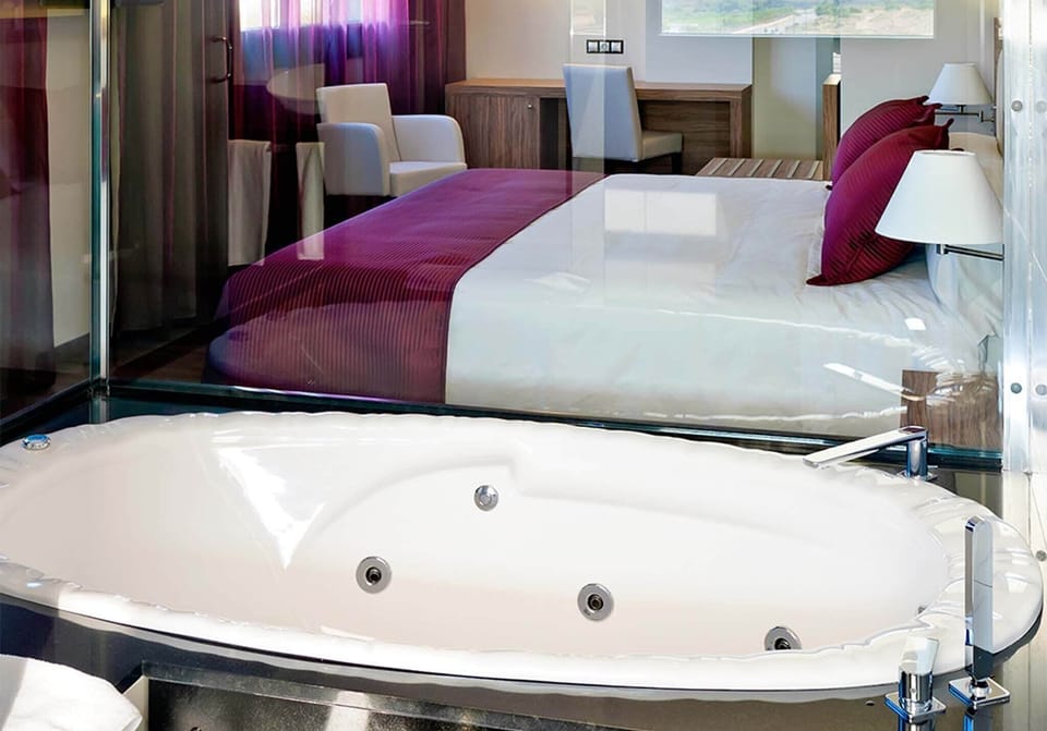 Premium Double Room, 1 King Bed, Hot Tub, Lagoon View (Platinum) | Memory foam beds, minibar, in-room safe, desk