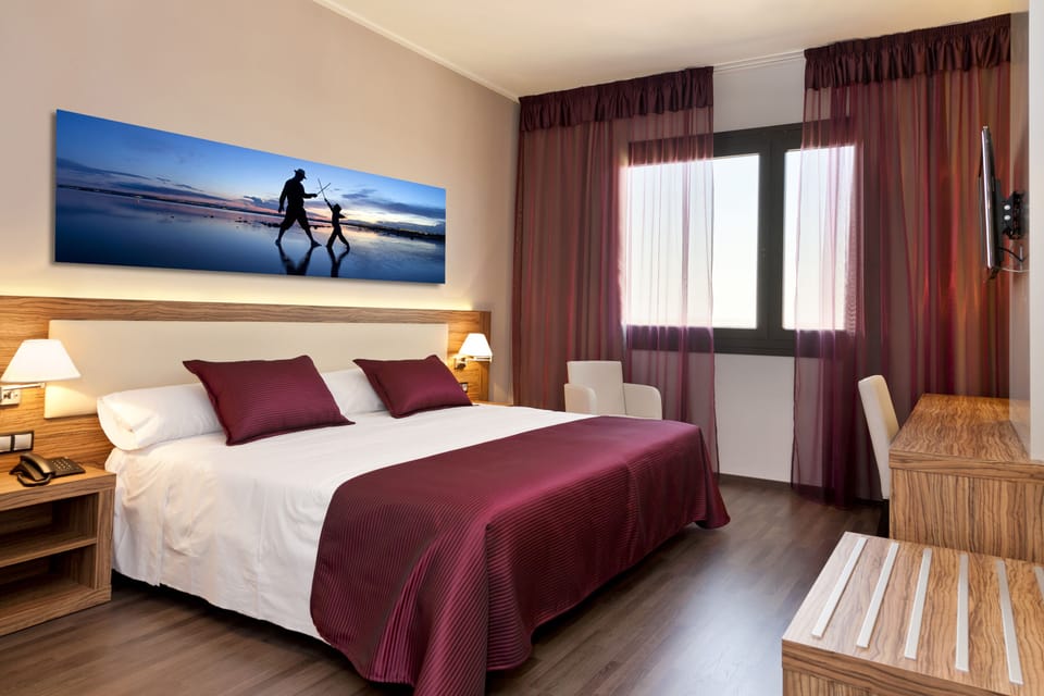 Memory foam beds, minibar, in-room safe, desk