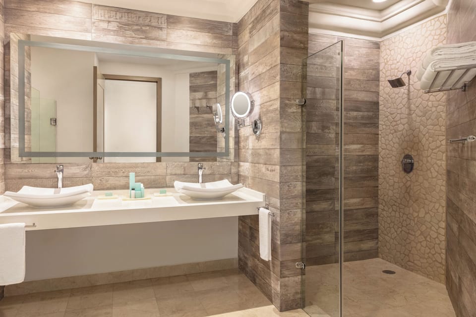 Premium Suite, 1 Bedroom, Oceanfront (Master) | Bathroom | Shower, eco-friendly toiletries, hair dryer, towels