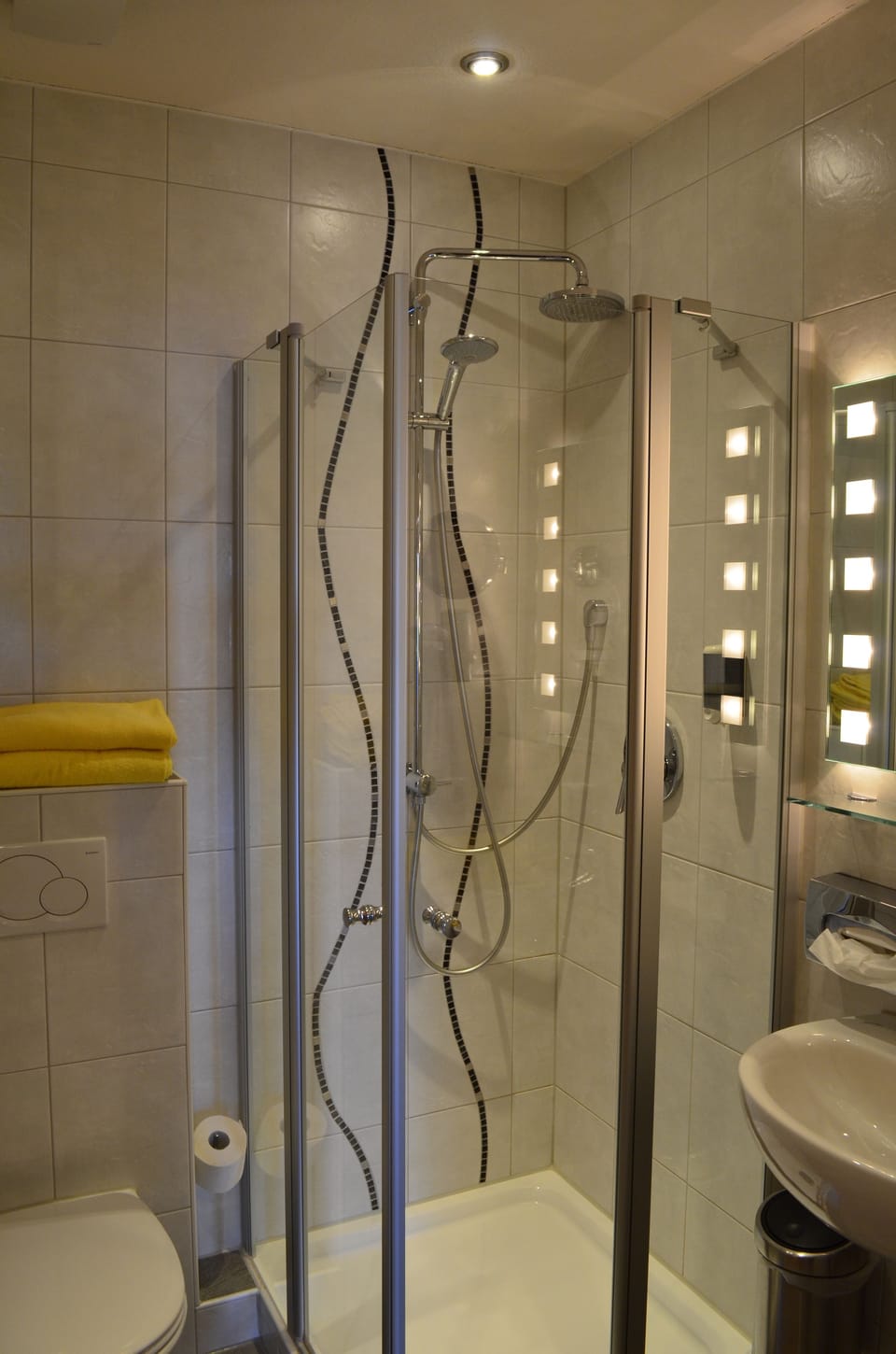 Shower, free toiletries, hair dryer, towels