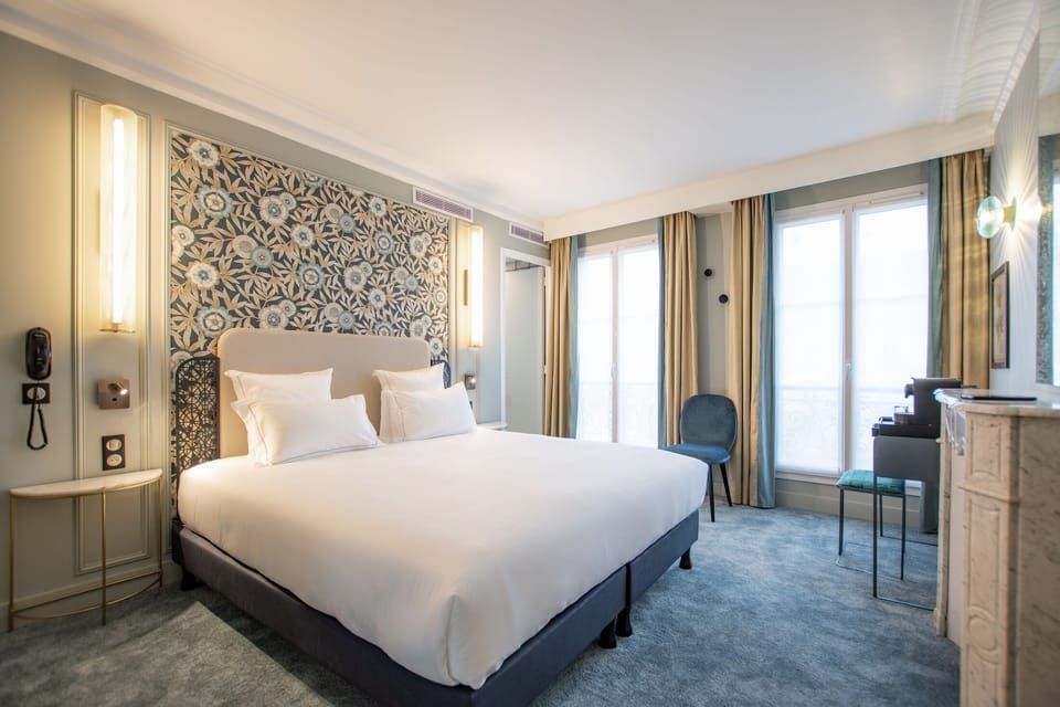 Deluxe Room | Minibar, in-room safe, individually furnished, desk