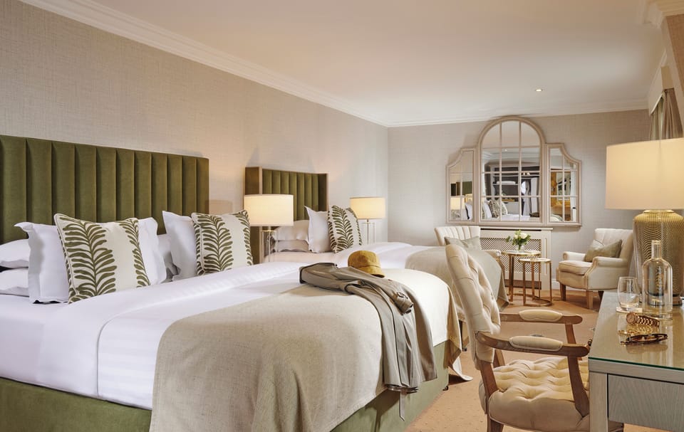 Deluxe King | Premium bedding, in-room safe, individually decorated