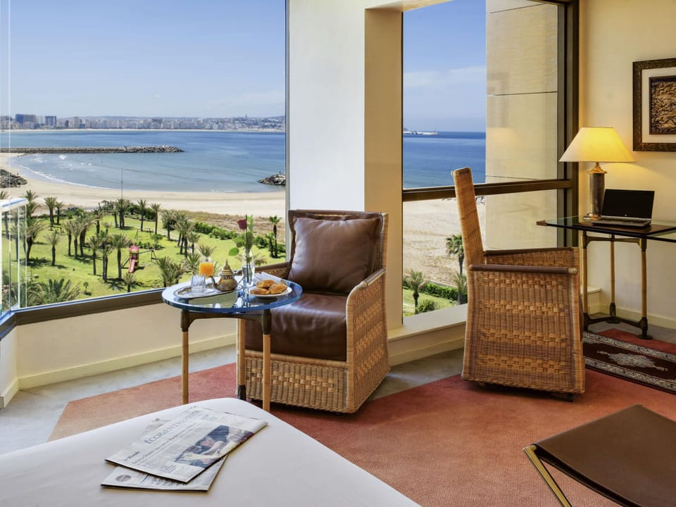 Deluxe Room, 1 King Bed, Sea View | Minibar, in-room safe, desk, laptop workspace