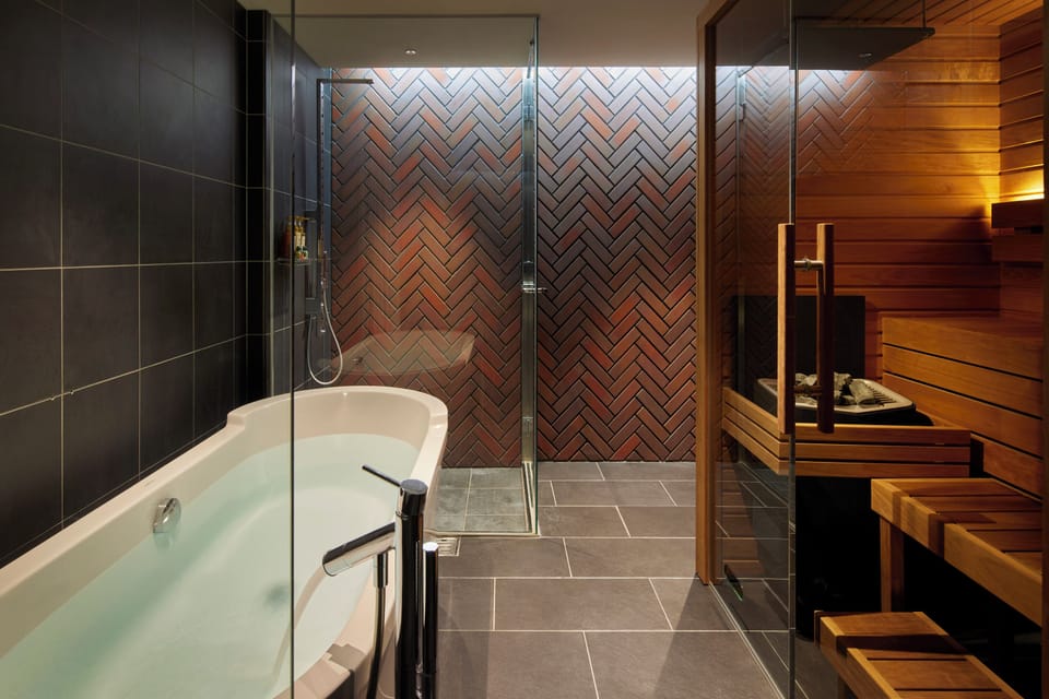 Newly Renovated Deluxe Suite with Private Sauna Non-Smoking (Dec 2025) | Bathroom | Combined shower/tub, hair dryer, slippers, bidet