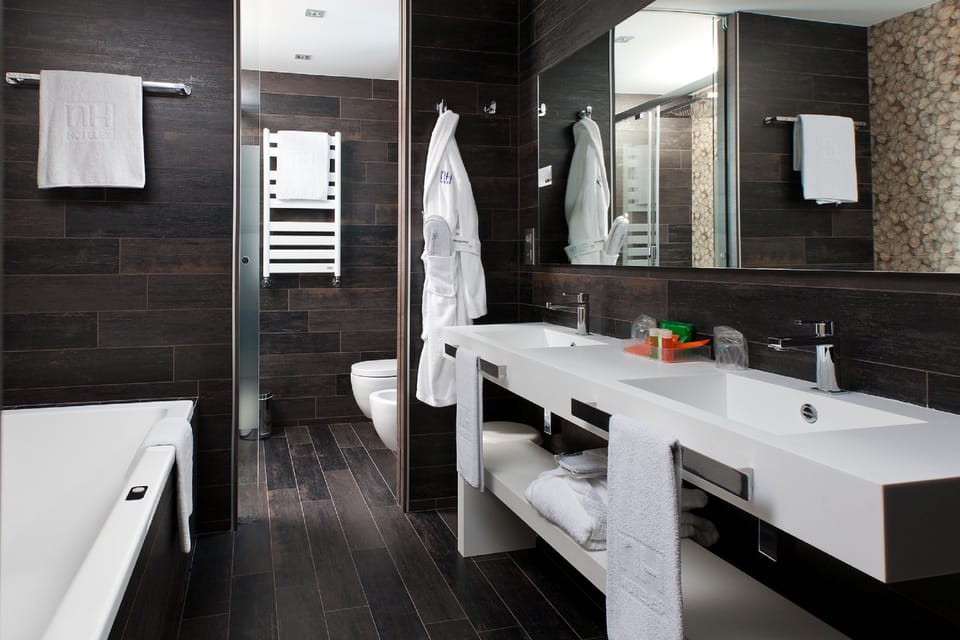 Eco-friendly toiletries, hair dryer, towels, soap