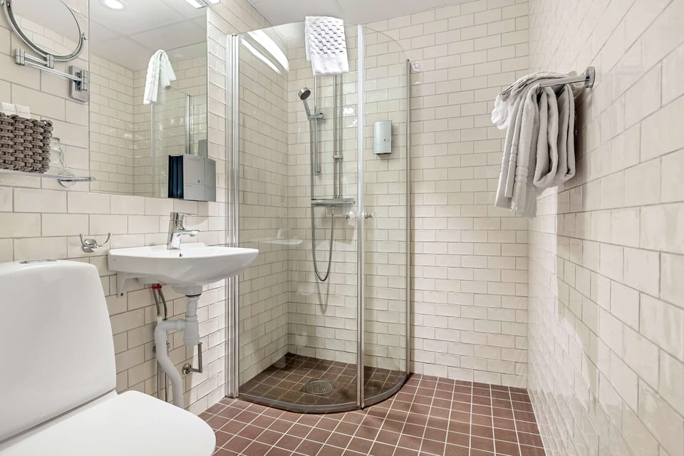 Shower, free toiletries, hair dryer, towels