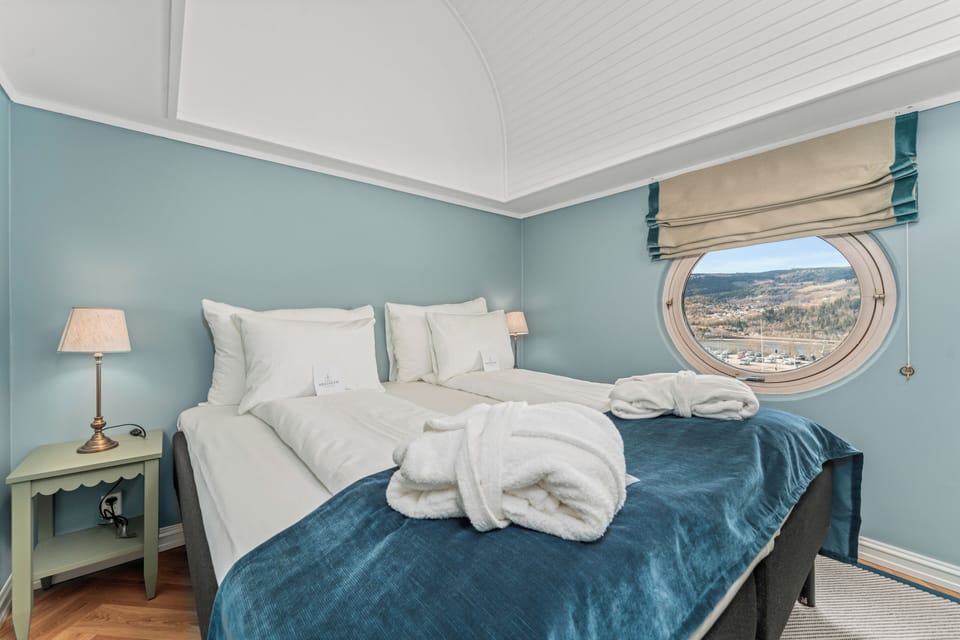Suite | Premium bedding, desk, laptop workspace, blackout drapes