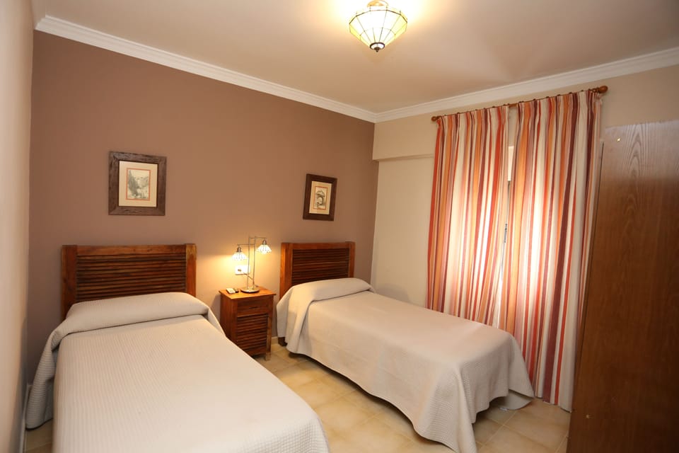 Standard Twin Room, City View | Desk, soundproofing, free cribs/infant beds, rollaway beds