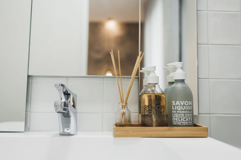 Rainfall showerhead, hair dryer, slippers, towels