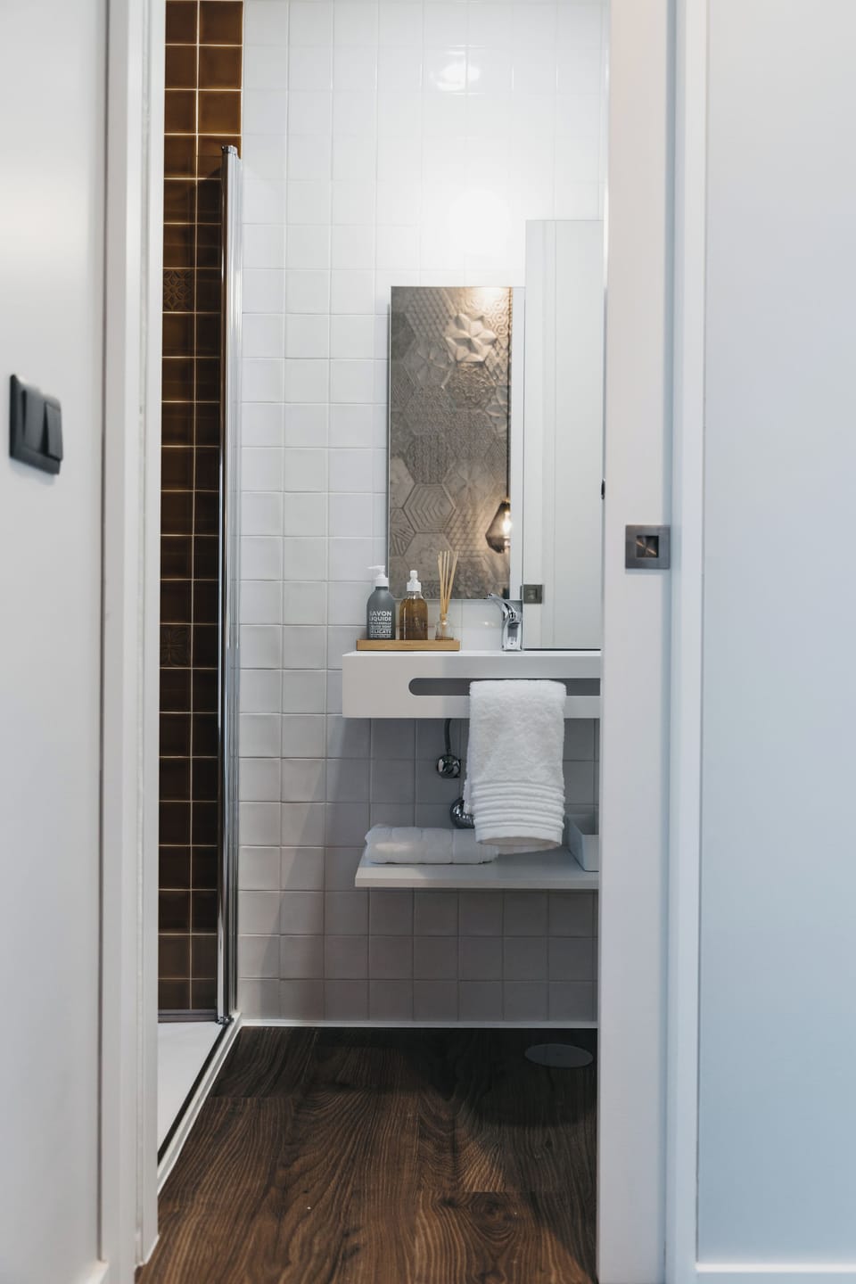 Rainfall showerhead, hair dryer, slippers, towels