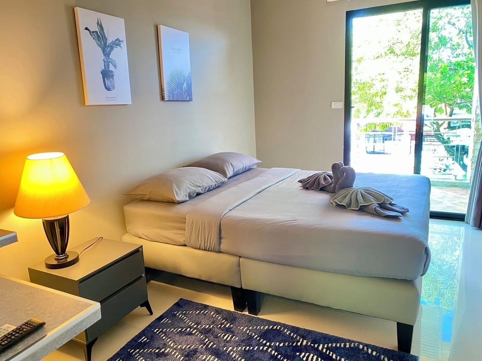 Family Quadruple Room, 2 Bedrooms | Blackout drapes, WiFi (free), bed sheets