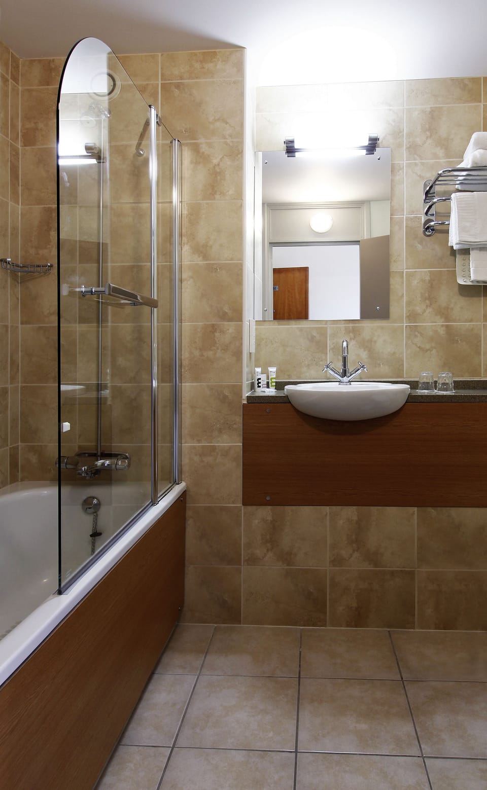 Combined shower/tub, towels, soap, shampoo