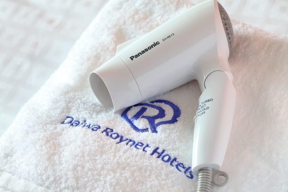 Shower, free toiletries, hair dryer, slippers
