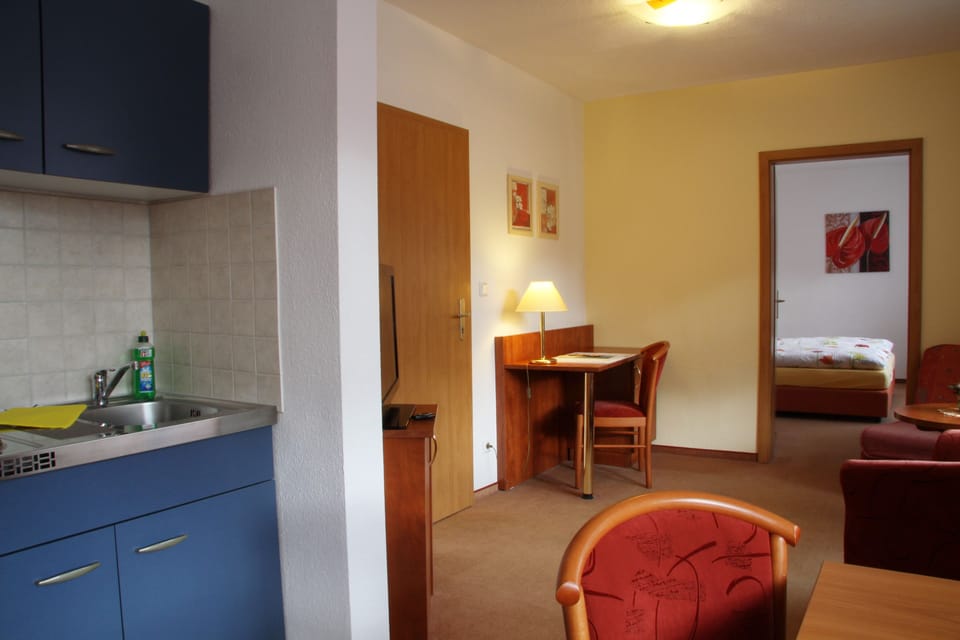 Family Room | Hypo-allergenic bedding, minibar, in-room safe, individually furnished