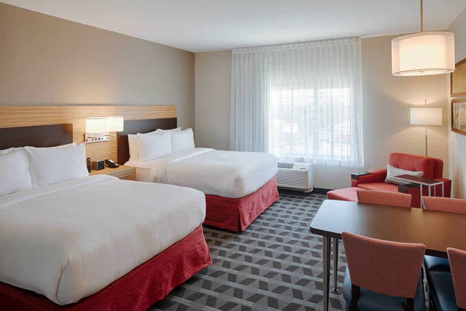 Premium bedding, down comforters, pillowtop beds, desk