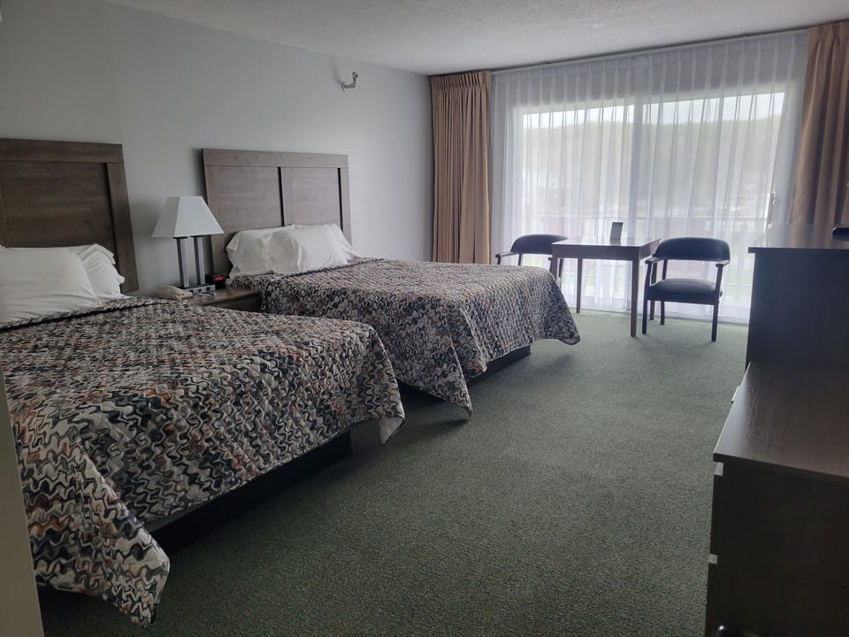 Desk, blackout drapes, iron/ironing board, free WiFi