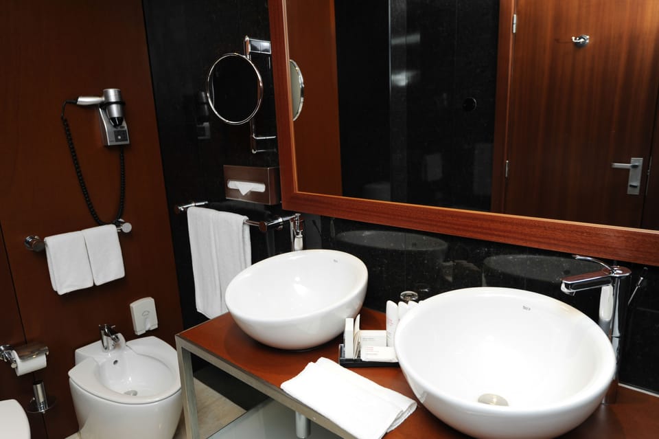 Shower, free toiletries, hair dryer, slippers