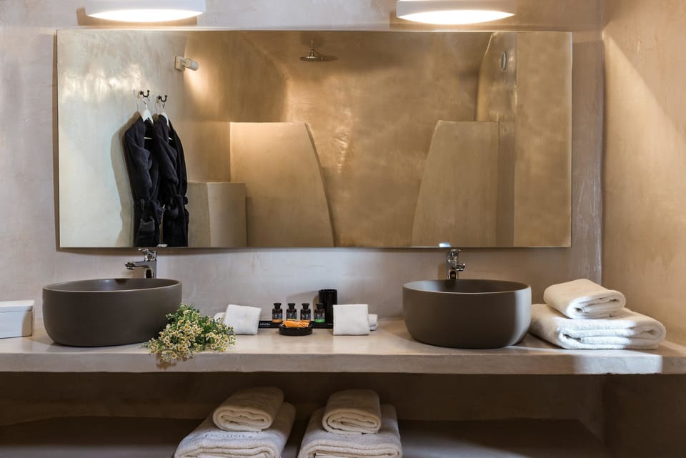 Two Bedroom Suite with Infinity Pool | Bathroom | Eco-friendly toiletries, hair dryer, bathrobes, slippers