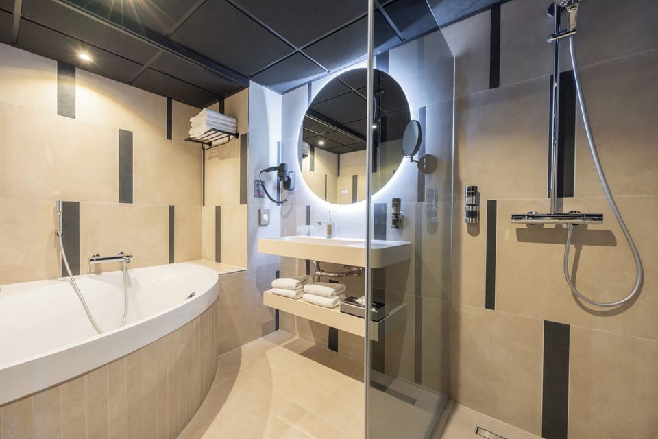 Separate tub and shower, free toiletries, hair dryer, towels