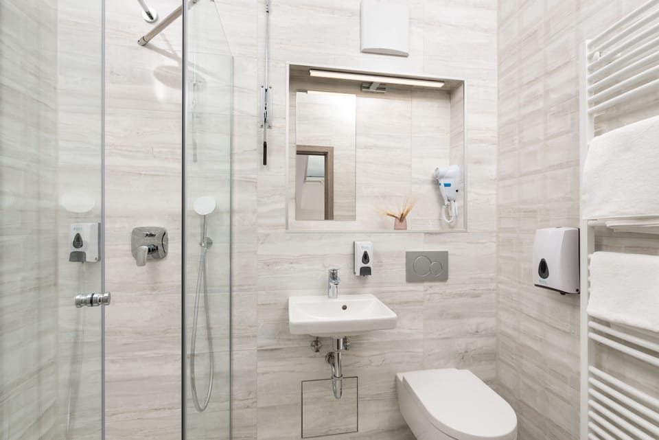 Romantic Double Room, 1 Queen Bed | Bathroom | Shower, rainfall showerhead, hair dryer, heated floors