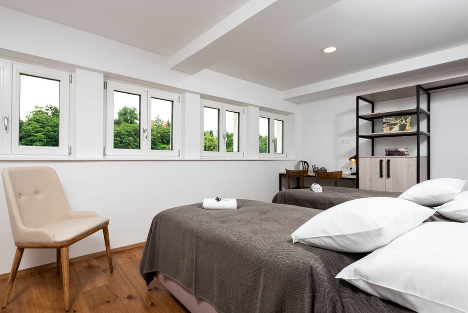 Panoramic Suite, 2 Bedrooms, River View | Premium bedding, individually furnished, desk, laptop workspace