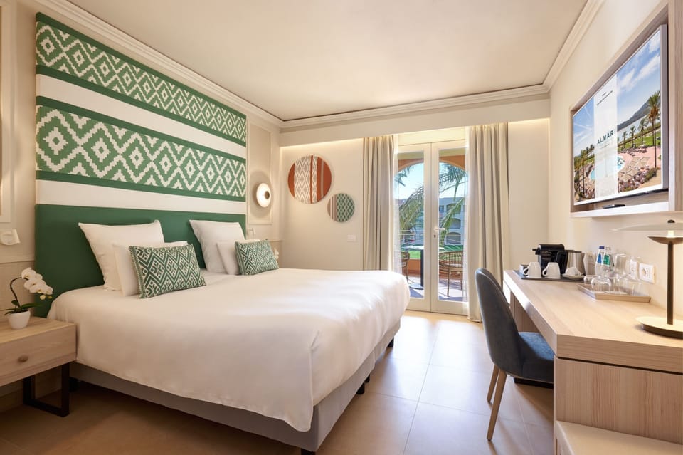 Premium bedding, down comforters, minibar, in-room safe